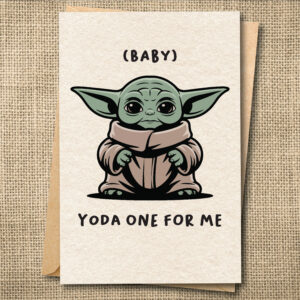 Baby Yoda sitting on a funny love greeting card with the message Yoda One for Me