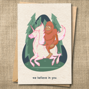 Whimsical unicorn and sasquatch greeting card reading We believe in you