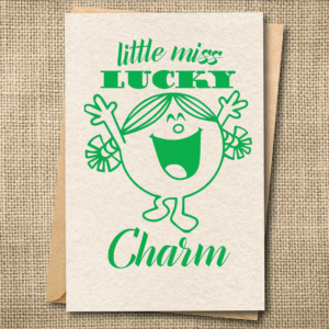 Little Miss Lucky Charm St. Patrick's Day greeting card with a playful green character