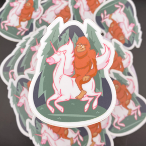 Sasquatch riding a unicorn holographic vinyl sticker artwork