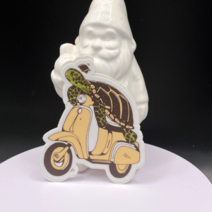 Funny turtle on a moped vinyl sticker artwork
